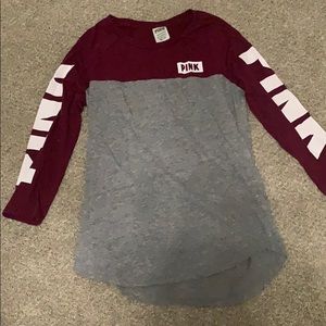 Long sleeve shirt with “pink” on front and sleeves